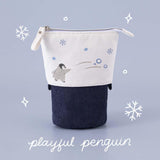 Tsuki ‘Dreams of Snow’ Pop-Up Pencil Case in Playful Penguin in light blue background