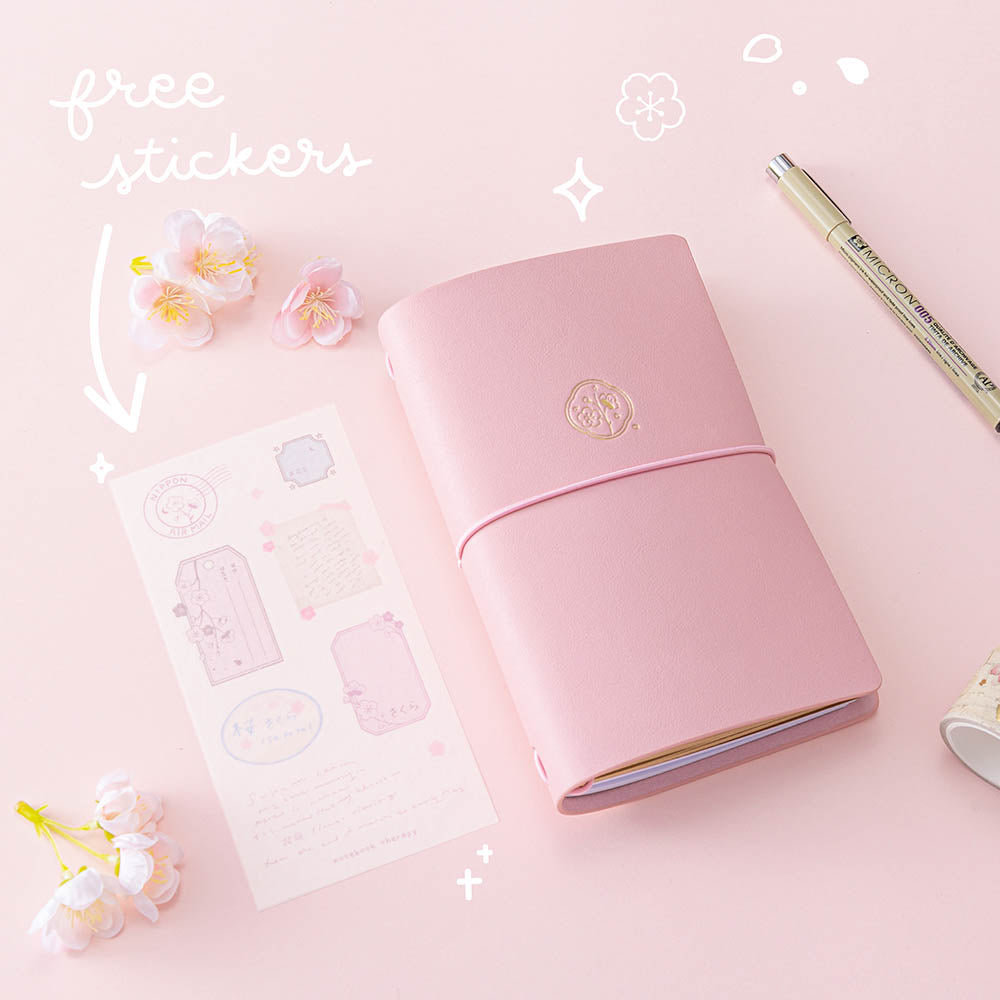 Tsuki ‘Sakura Journey’ Limited Edition Travel Notebook with free stickers sheet with micron pen and cherry blossoms on pink background