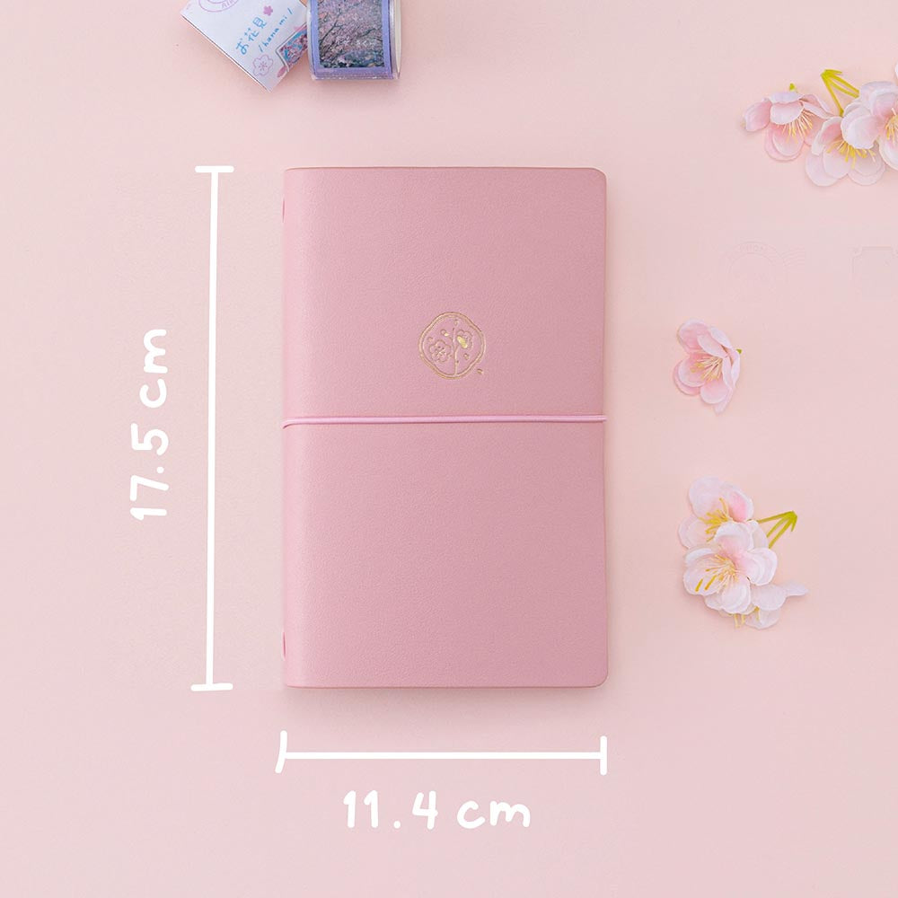 Tsuki ‘Sakura Journey’ Limited Edition Travel Notebook measuring 17.5cm by 11.4cm with cherry blossoms on pink background