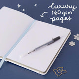 Open Tsuki ‘Suzume’ Winter Limited Edition Bullet Journal with luxury 160GSM pages and free bookmark gift with pen and snowflakes on navy background